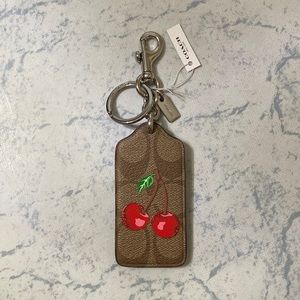 SOLD! Coach F26853 Signature Cherry Bag Charm